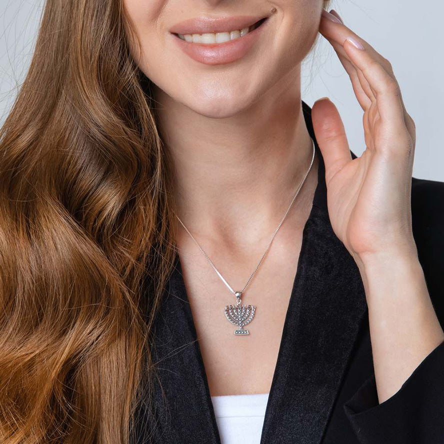 Menorah pendant with the word ‘Jerusalem’ creatively formed above.